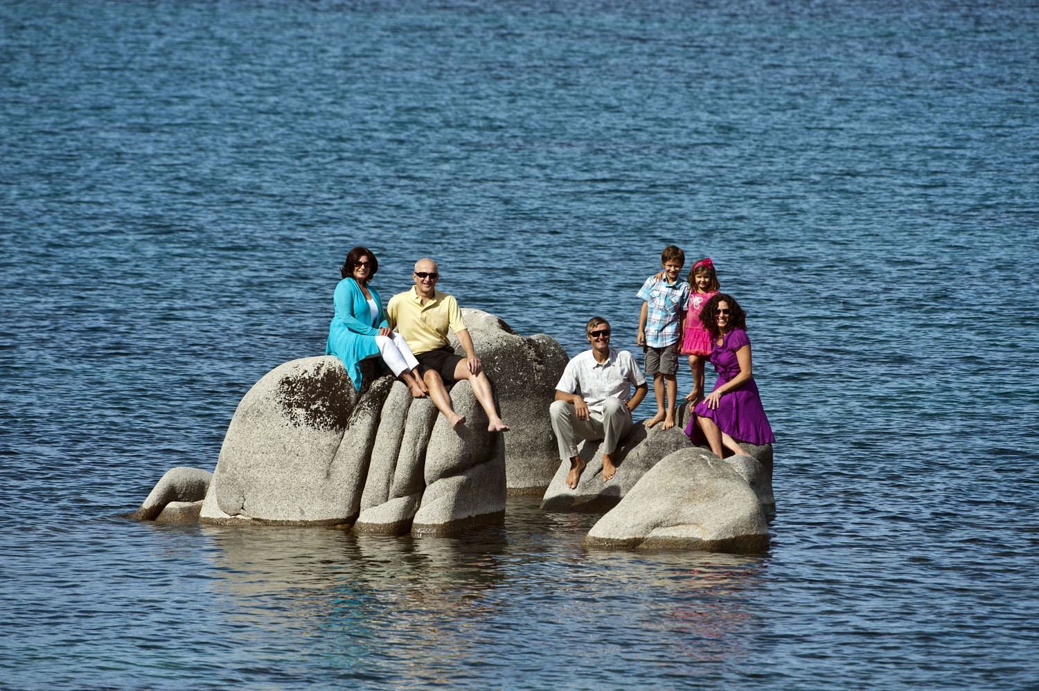 family photo on rocks