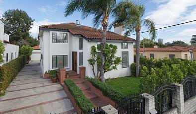 EXPANSIVE MODERN CORNER LOT HOME